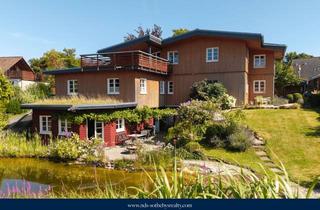 Haus kaufen in 37181 Hardegsen, Exklusives Massivholz-Haus mit vielseitiger Nutzung in idyllischer Lage
