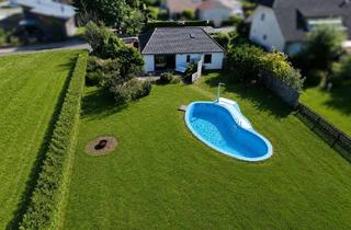 Haus kaufen in 56593 Pleckhausen, Renovierter Bungalow mit Pool und schönem Grundstück OT Horhausen - Wohnen auf einer Ebe