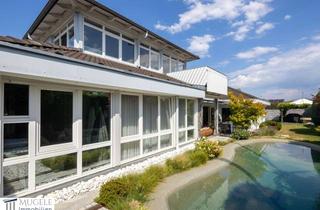 Einfamilienhaus kaufen in 71154 Nufringen, Exklusives Wohnen im Bungalowstil – Freistehendes Einfamilienhaus mit Pool in Nufringen
