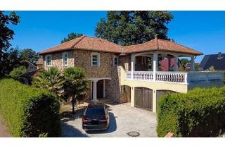Einfamilienhaus kaufen in 26180 Rastede, Mediterranes Einfamilienhaus im Finca-Stil in Wahnbek