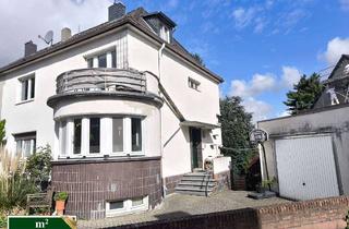 Haus kaufen in 40882 Ratingen, Neu im Angebot - Zentrumsnahe Lage in Ratingen - Zwei-Parteienhaus mit viel Potential