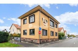 Mehrfamilienhaus kaufen in 63165 Mühlheim, Modernisiertes Mehrfamilienhaus mit 7 Zimmern, 3 Tageslichtbädern, Garten und Garage