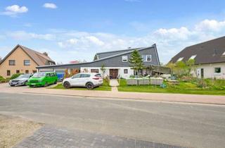 Mehrfamilienhaus kaufen in 28857 Syke, Vermietetes Mehrfamilienhaus in Syke