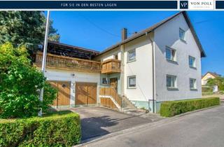 Haus kaufen in 77948 Friesenheim, Zweifamilienhaus mit Dachgeschoss-Ausbaupotenzial und vier Garagen