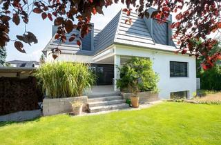Haus kaufen in 63150 Heusenstamm, Exklusives Wohnen am Feldrand-modernes Familienhaus mit Weitblick