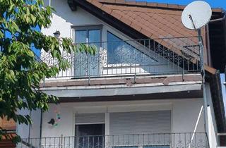 Wohnung kaufen in 63110 Rodgau, Rodgau Rollwald: Charmante 4-Zimmer-Wohnung im "Haus-im-Haus"-Stil mit Garten und zwei Balkonen