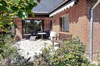 Haus kaufen in 21376 Salzhausen, Charmanter Winkel-Bungalow in zweiter Reihe auf großem Grundstück in zentraler Lage von Salzhausen