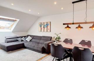 Wohnung kaufen in 64569 Nauheim, Wohnen wie im eigenen Haus: Großzügige Maisonette über drei Ebenen