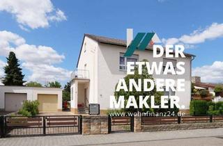 Haus kaufen in 65462 Ginsheim-Gustavsburg, Straßenansicht? Der Garten stiehlt dem Haus die Show!