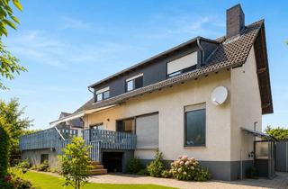 Einfamilienhaus kaufen in 64560 Riedstadt, Familienfreundliches Einfamilienhaus mit großzügigem Garten und ausgebautem Keller