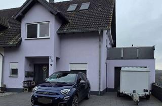 Doppelhaushälfte kaufen in 56348 Dahlheim, Doppelhaushälfte in Dahlheim mit Weitblick & EinliegerwohnungIhr neues Zuhause im Mittelrheintal