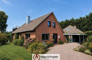 Einfamilienhaus kaufen in 26624 Südbrookmerland, Einfamilienhaus mit Einliegerwohnung – Viel Platz für Familie und Beruf