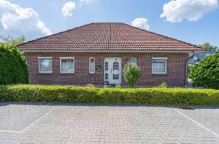 Haus kaufen in 26676 Barßel, Stilvoller Bungalow auf einer Ebene – Ruhiges Wohnen mit Ausbaureserve in Barßel
