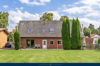 Haus kaufen in Hauptstraße, 18574 Garz, Zwei Einheiten unter einem Dach: Doppelhaus mit Einliegerwohnung, zwei Kaminen und großem Garten!