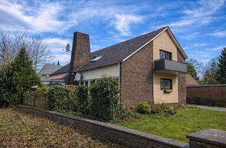 Haus kaufen in 27777 Ganderkesee, Solide Kapitalanlage - Vermietetes Zweifamilienhaus mit Garagen und Stellplätzen