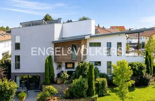 Haus kaufen in 64572 Büttelborn, Außergewöhnliche Architektur mit viel Platz in begehrter Feldrandlage
