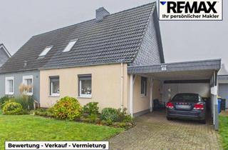Doppelhaushälfte kaufen in 24536 Neumünster, Modernisierte Doppelhaushälfte in familienfreundlicher Lage mit den gewissen Extras