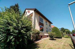 Haus kaufen in 34233 Fuldatal, Freistehendes Zweifamilienhaus mit großem Gartengrundstück, 4 Garagen und toller Nutzungsperspektive
