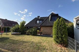 Haus kaufen in 21271 Hanstedt, vermietetes Zweifamilienhaus in Hanstedt OT Quarrendorf
