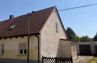 Doppelhaushälfte kaufen in 06295 Lutherstadt Eisleben, Doppelhaushälfte mit Doppelgarage in Eisleben – ideal für Handwerker