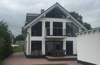 Einfamilienhaus kaufen in Zur Schoritzer Wiek 32, 18574 Garz, Grosszügiges Einfamilienhaus mit Doppelgarage und weiterem Baugrundstück