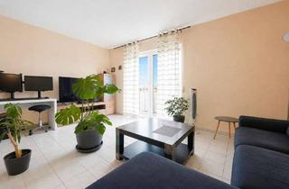 Wohnung kaufen in 64560 Riedstadt, Gepflegte 2-Zimmer-Wohnung mit Balkon