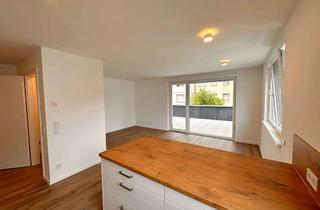 Wohnung kaufen in 78112 St. Georgen, Vermietete 2,5-Zimmer-Neubauwohnung mit Balkon, Einbauküche & KfW 40