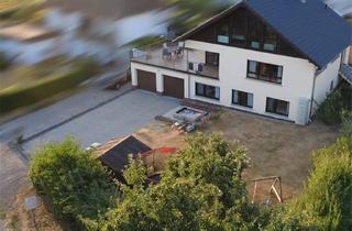 Haus kaufen in 56581 Ehlscheid, Großzügiges Familienhaus mit Einliegerbereich & Garten