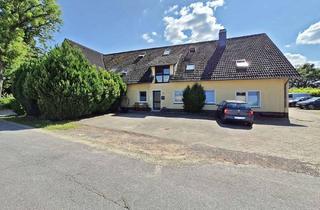 Mehrfamilienhaus kaufen in 32469 Petershagen, Gepflegtes Mehrfamilienhaus - 7 Wohnungen und weiteres Potential durch mögliches Bauland