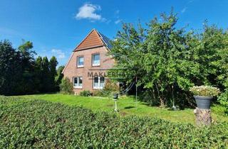 Einfamilienhaus kaufen in 26969 Butjadingen, Nordsee-Perle Tossens: Saniertes Haus auf Traumgrdst. m. Photovoltaik & zusätzl. Bauoption im Grünen