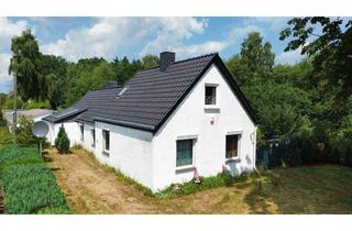 Haus kaufen in 27777 Ganderkesee, Einfamilien Haus auf großen Grundstück mit Nebengebäuden