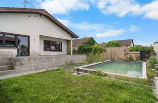 Haus kaufen in 64584 Biebesheim, Freistehender Bungalow mit begonnener Modernisierung