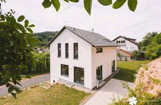 Haus kaufen in 97843 Neuhütten, BERK Immobilien – Zukunftssicheres Wohnen mit Aussicht: Neuwertiges Effizienzhaus in Neuhütten