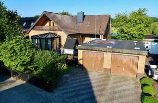 Einfamilienhaus kaufen in 26388 Sengwarden, Großzügiges Einfamilienhaus mit Wintergarten, Doppelgarage und Mehrgenerationenpotenzial