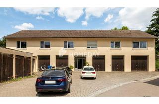 Anlageobjekt in 73479 Ellwangen, Solides und rentables Zweifamilienhaus mit zwölf Garagen und idyllischem Garten in Ellwangen