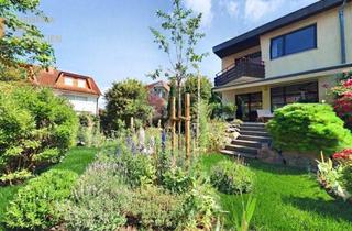 Haus kaufen in 63110 Rodgau, Helles Split-Level-Wohnen mit Garten in begehrter Lage von Rodgau Nieder-Roden
