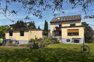 Haus kaufen in 55595 Hargesheim, Hargesheim - Zweifamilienhaus mit großem Garten und 2 Garagen