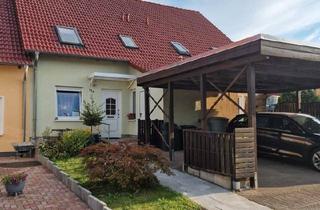 Haus kaufen in 18190 Sanitz, Sanitz - Gepflegtes Reihenmittelhaus mit überdachter Terrasse und Garten