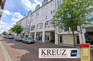 Wohnung kaufen in 65428 Rüsselsheim, Großzügige 4-Zimmer-Wohnung in zentraler Lage von Rüsselsheim mit großer Terrasse und 3 Stellplätzen