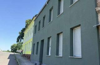 Mehrfamilienhaus kaufen in An Der Eisenbahn 15, 06862 Roßlau, Vielseitiges Mehrfamilienhaus: Großzügiges Raumangebot in Roßlau