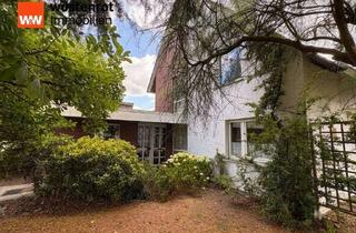 Einfamilienhaus kaufen in 49163 Bohmte, Großzügiges Einfamilienhaus mit besonderem Charme, viel Platz und idyllischem Garten