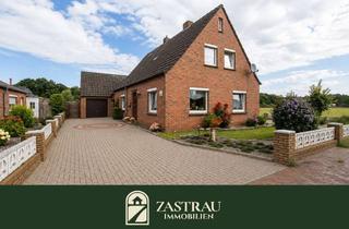 Einfamilienhaus kaufen in 26624 Südbrookmerland, Vermietetes Einfamilienhaus mit großem Grundstück in Südbrookmerland