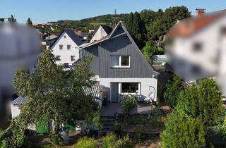 Haus kaufen in 64380 Roßdorf, Charmantes Zweifamilienhaus mit großem Grundstück in ruhiger und zentraler Lage von Roßdorf