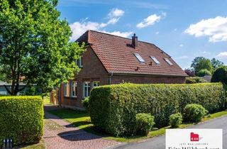 Haus kaufen in 26129 Bloherfelde, Charmantes Wohnhaus im Landhausstil mit zwei Garagen im Grünen