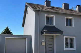 Doppelhaushälfte kaufen in 52249 Eschweiler, Modernisierte Doppelhaushälfte mit flexiblem Raumkonzept