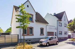 Einfamilienhaus kaufen in 65428 Rüsselsheim, Modernisiertes, freistehendes Einfamilienhaus mit Garten zentral in Rüsselsheim