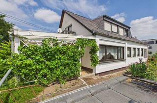 Einfamilienhaus kaufen in 56075 Karthause, Solides Einfamilienhaus mit idyllischem Garten in Koblenz-Karthause!