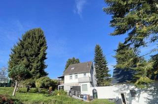 Einfamilienhaus kaufen in 56593 Niedersteinebach, Großes Grundstück mit Fernblick! - modernisiertes Einfamilienhaus mit Nebengebäude
