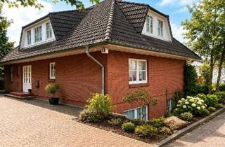 Haus kaufen in 24558 Henstedt-Ulzburg, Henstedt-Ulzburg - Gepflegtes Dreifamilienhaus mit 3 Garagen auf großem Grundstück