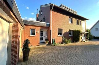 Mehrfamilienhaus kaufen in 33775 Versmold, Stilvoll wohnen und nachhaltig investieren – Mehrfamilienhaus mit WEG-Aufteilung in Versmold